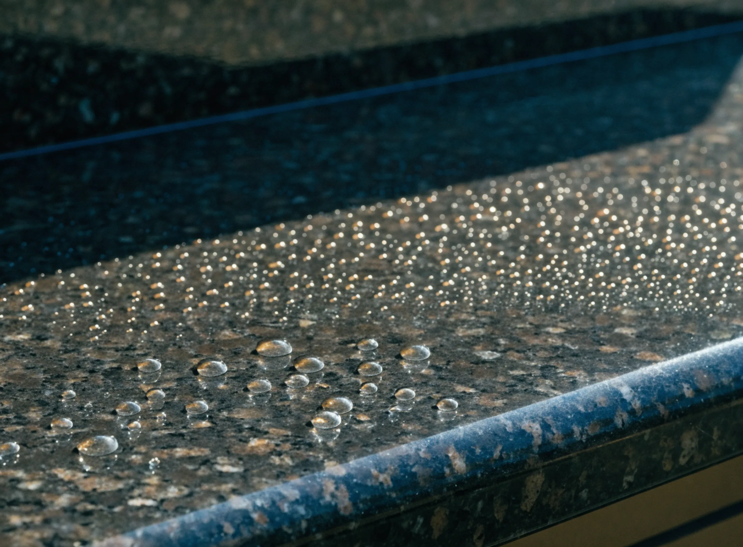 Water beading on a sealed granite countertop, the simple test for whether the sealer is still working